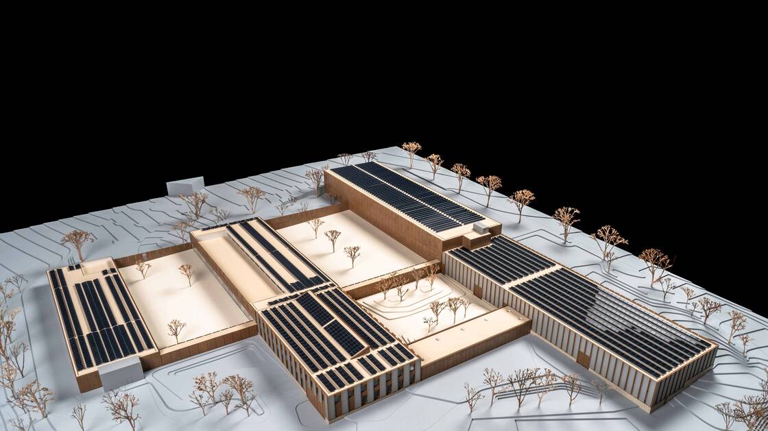 Die Abbildung zeigt das Modell vom Sammlungszentrum des Schweizerischen Nationalmuseums in Affoltern am Albis, wo der Erweiterungsbau an die bestehenden Gebäude anschliesst.