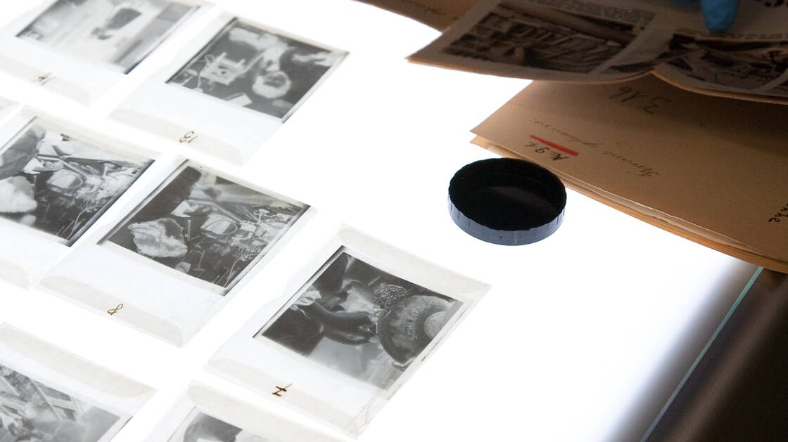 Photo negatives on a light desk